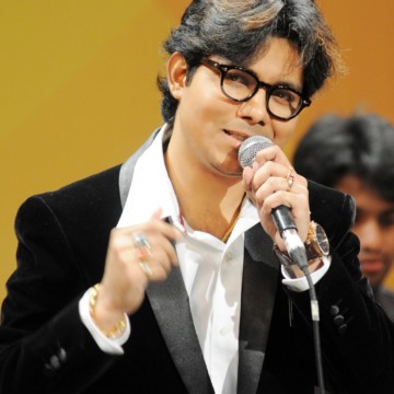 Sagnik Sen infront of microphone