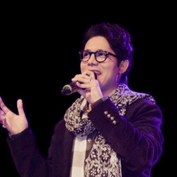 Singer Sagnik Songs with microphone